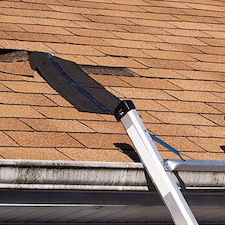 How to Tell If Wind Lifted Your Shingles After a Storm